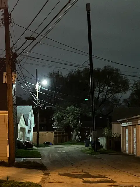 The quiet mystery of a nighttime alley.